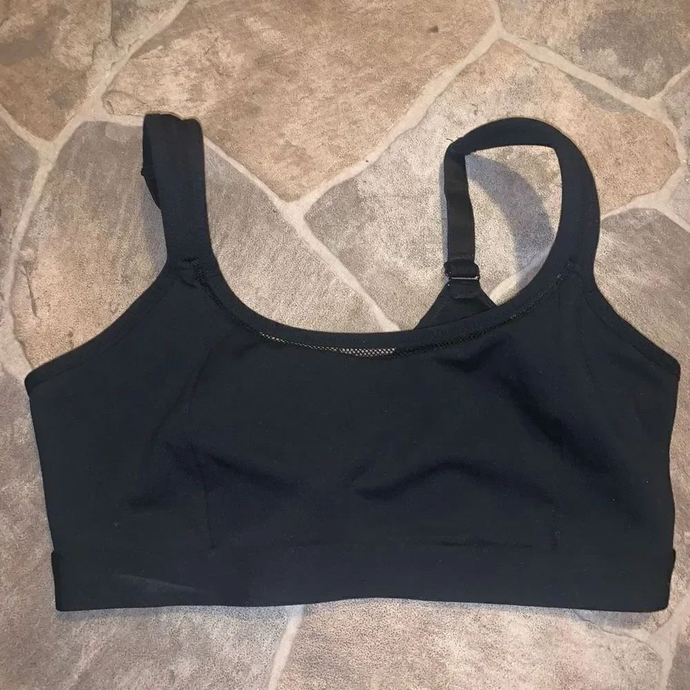 Fabletics L Athleisure black cutaway high impact sports bra